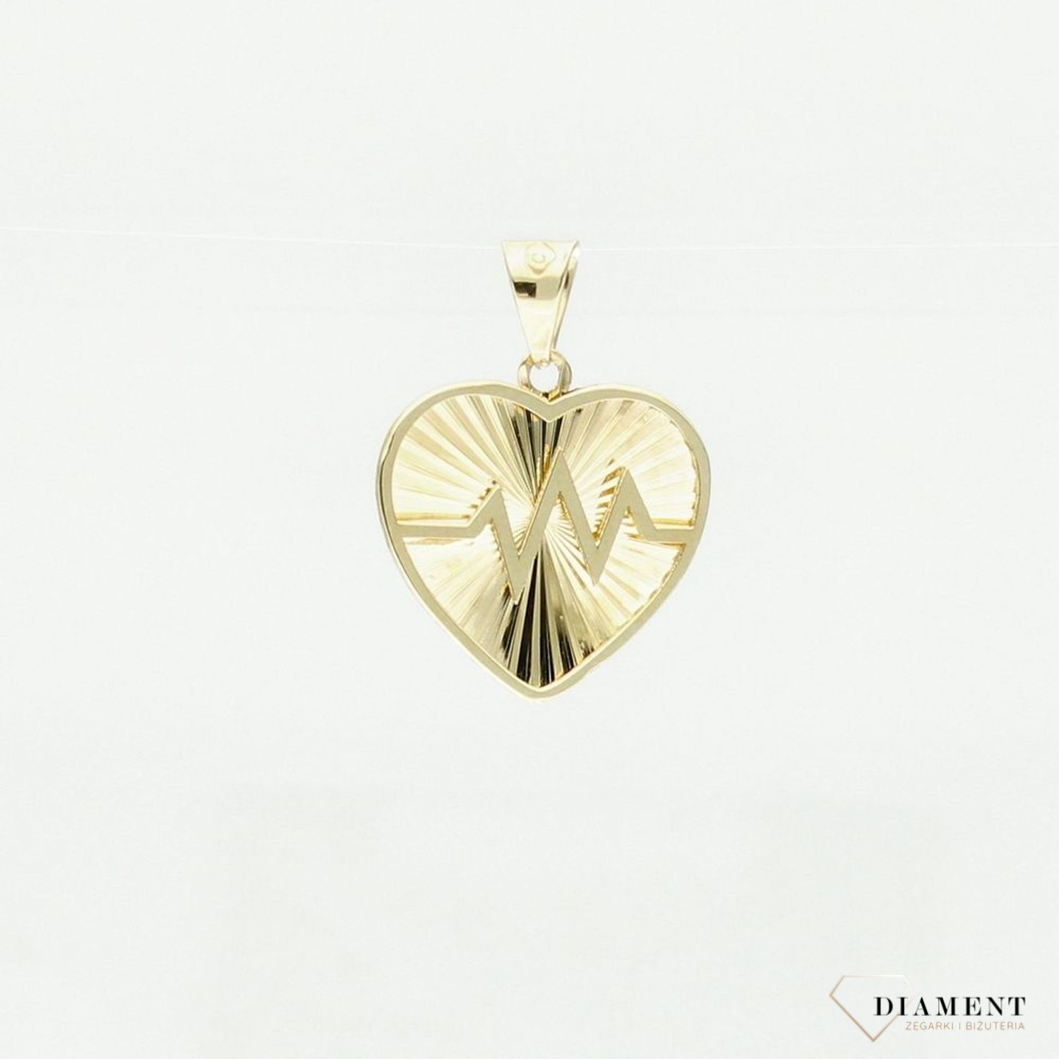 Złota zawieszka w kształcie serca ze znakiem linii życia to idealny prezent dla ukochanej. Możliwy grawer za 0zł. Zapraszamy!.jpg